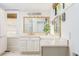 Bright bathroom features double vanity with lots of storage and large mirror at 1012 Bellevue Ne Dr, Atlanta, GA 30306