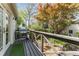 Inviting deck with a grill, comfortable seating, and lush greenery, creating a perfect outdoor retreat at 1012 Bellevue Ne Dr, Atlanta, GA 30306