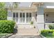Charming home with a brick facade and front yard landscaping, complete with an inviting entrance at 1012 Bellevue Ne Dr, Atlanta, GA 30306