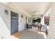 Inviting front porch with comfortable seating, a porch swing, and stylish decor, great for relaxing and entertaining guests at 1012 Bellevue Ne Dr, Atlanta, GA 30306
