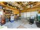 Spacious garage with storage shelves, tools, and overhead beams, offering ample room for vehicles and hobbies at 1012 Bellevue Ne Dr, Atlanta, GA 30306