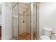 Bathroom features glass shower enclosure with tile surround, and tile floors at 1012 Bellevue Ne Dr, Atlanta, GA 30306