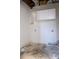 Unfinished basement laundry area with upper cabinets and concrete floors at 186 Majesty Dr, Rockmart, GA 30153
