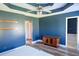 Bedroom features wood-look flooring, tray ceilings and contemporary fixtures at 186 Majesty Dr, Rockmart, GA 30153