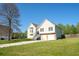 Charming home with a two-car garage, complemented by a well-maintained lawn and classic design elements at 186 Majesty Dr, Rockmart, GA 30153