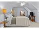 Upstairs bedroom with a ceiling fan, sloped ceilings, neutral walls and carpet at 2407 Honey Ct, Mcdonough, GA 30252