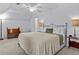 Bedroom featuring a ceiling fan, sloped ceilings, neutral walls, and carpet at 2407 Honey Ct, Mcdonough, GA 30252
