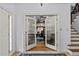 Entryway looking into an organized home office with natural light at 2407 Honey Ct, Mcdonough, GA 30252