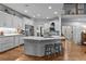 Spacious kitchen with large island, stainless appliances, and natural hardwood flooring at 2407 Honey Ct, Mcdonough, GA 30252