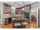 Beautiful kitchen featuring dark wood cabinets, granite countertops, and stainless steel appliances at 2885 Arborwoods Dr, Alpharetta, GA 30022