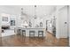 Open kitchen featuring a center island, stainless steel appliances, and seamless access to the adjacent living area at 330 Plantation Way, Roswell, GA 30075