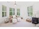 Bedroom sitting area with large windows and comfortable seating at 330 Plantation Way, Roswell, GA 30075