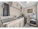 Functional kitchenette featuring essential appliances, ample counter space, and natural light at 3585 Legacy Trce, Alpharetta, GA 30022