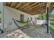 Relaxing patio with a hammock and comfortable seating area at 3585 Legacy Trce, Alpharetta, GA 30022