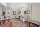 Inviting sitting area with two chairs, decorative rug, and views to the outside at 3585 Legacy Trce, Alpharetta, GA 30022