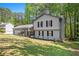 Charming two-story home with a well-manicured lawn and mature trees in a serene neighborhood at 2022 Ramblewood Ne Ct, Marietta, GA 30062