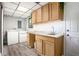 Bright laundry room with sink, overhead cabinets, washer and dryer at 2022 Ramblewood Ne Ct, Marietta, GA 30062