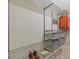 Walk-in closet complete with metal shelving and storage baskets for organization at 1970 Glen Eves Dr, Roswell, GA 30076