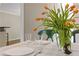 Close-up on a dining table with tulips, glasses, plates, silverware, and a decorative mouse at 1970 Glen Eves Dr, Roswell, GA 30076