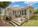 Charming home exterior with a spacious patio, perfect for outdoor enjoyment and entertaining at 1970 Glen Eves Dr, Roswell, GA 30076
