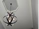 Unique, modern chandelier hangs from the tray ceiling at 3097 Trinity Grove Dr, Dacula, GA 30019