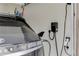 Electric vehicle charging station installed in a residential garage at 3097 Trinity Grove Dr, Dacula, GA 30019