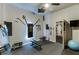 Well-equipped home gym featuring a full mirror, weights, and exercise equipment at 3097 Trinity Grove Dr, Dacula, GA 30019