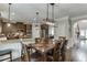 Kitchen and Dining Area combination; hardwood floors and granite countertops at 3097 Trinity Grove Dr, Dacula, GA 30019
