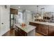 Spacious kitchen featuring stainless steel appliances, granite countertops, and a center island at 3097 Trinity Grove Dr, Dacula, GA 30019