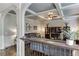 Cozy living room with coffered ceilings, comfortable seating, and a view of the home's interior at 3097 Trinity Grove Dr, Dacula, GA 30019