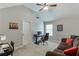 Functional office space with a sofa, desk, and natural light, ideal for working from home at 3097 Trinity Grove Dr, Dacula, GA 30019