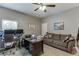 Functional home office with dual monitors, comfortable seating, and ample workspace, ideal for productivity and organization at 3097 Trinity Grove Dr, Dacula, GA 30019