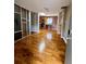 Inviting hallway with sleek hardwood flooring leading into an open-concept kitchen space at 562 Formwalt Sw St # 4, Atlanta, GA 30312