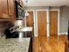 Kitchen featuring granite countertops, stainless steel appliances, and hardwood floors at 562 Formwalt Sw St # 4, Atlanta, GA 30312