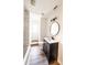 Beautiful bathroom featuring a shower/tub combo, modern fixtures, and an updated vanity at 948 Reed Ave, Atlanta, GA 30344