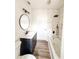 Updated bathroom featuring a tub shower, modern fixtures, and new vanity at 948 Reed Ave, Atlanta, GA 30344
