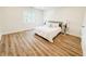 Bright bedroom with neutral decor, hardwood floors, and plenty of natural light at 948 Reed Ave, Atlanta, GA 30344