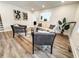 Bright living room with modern decor, hardwood floors, and comfortable seating arrangement at 948 Reed Ave, Atlanta, GA 30344