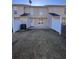 A spacious backyard with a patio and privacy fence at 212 Meadowlark Place, Austell, GA 30168