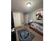 Bedroom with twin bed, Black Panther decor, and multiple storage options at 212 Meadowlark Place, Austell, GA 30168