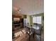 Cozy kitchen with stainless steel appliances and dining area at 212 Meadowlark Place, Austell, GA 30168