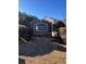 Community sign that reads 'Regency Station' with landscaping and well-manicured shrubs at 212 Meadowlark Place, Austell, GA 30168