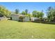 Wide angle view of the backyard, fence line, and the back of the home at 1085 Azalea Ne Cir, Marietta, GA 30062