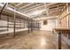 Unfinished basement featuring open ceiling, concrete floor and shelving at 1085 Azalea Ne Cir, Marietta, GA 30062