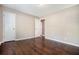 Bedroom with wood floors, neutral paint, two doorways and ample natural light at 1085 Azalea Ne Cir, Marietta, GA 30062