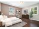 Bedroom featuring wood floors, neutral colors, bright light and tasteful modern decor at 1085 Azalea Ne Cir, Marietta, GA 30062