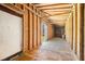 Unfinished room showcasing wood beams, floors and exposed framing at 1085 Azalea Ne Cir, Marietta, GA 30062