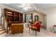 Cozy bonus room with built-in bookshelves and comfortable seating, ideal for a home office or recreation area at 1144 Bellewood Sq, Dunwoody, GA 30338