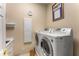 Functional laundry room with modern appliances, providing convenience and efficiency at 1144 Bellewood Sq, Dunwoody, GA 30338