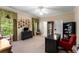 Office space with a large desk, two windows and dark wood accents at 1144 Bellewood Sq, Dunwoody, GA 30338